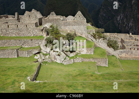 Ancient Inca ruins of Machu Picchu, the most known tourist site in Andes mountains, Peru. Stock Photo