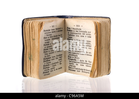 Spanish dictionary focused on photography word with its reflection on white background. Included clipping path, so you can easily cut it out and place over the top of a design. Stock Photo