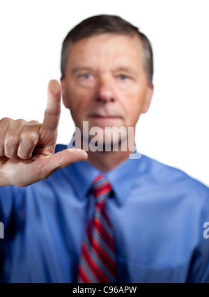 Senior executive or security man opens sensor by pressing finger onto the plate Stock Photo