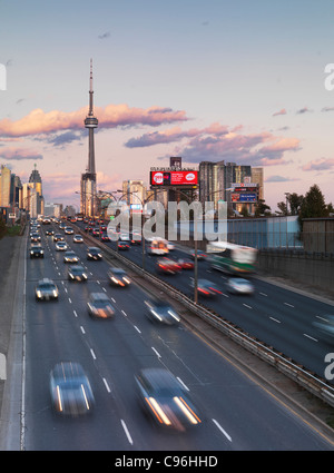 Sunset scenery the Gardiner Expressway leading to downtown Toronto. Ontario, Canada. Stock Photo