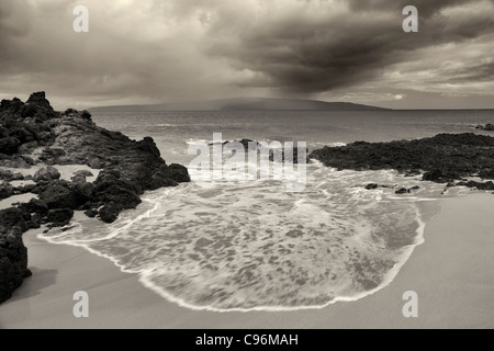 Storm with rain and beach off Maui, Hawaii. Stock Photo