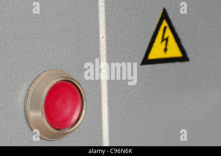 red button and lablel danger on the power board Stock Photo