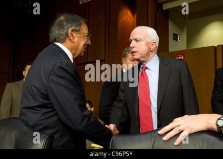 Secretary of Defense Leon E. Panetta greets Senator John McCain (R-Az) before testimony to the Senate Armed Services Committee on November 15, 2011. Secretary Panetta answered questions regarding the planned troop withdraw from Iraq at the end of this year.(DoD photo by Erin A. Kirk-Cuomo/AFLO) [000 Stock Photo