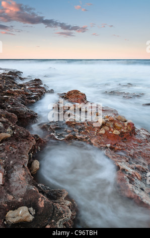 vertical seascape sunset made with wide angle lens Stock Photo