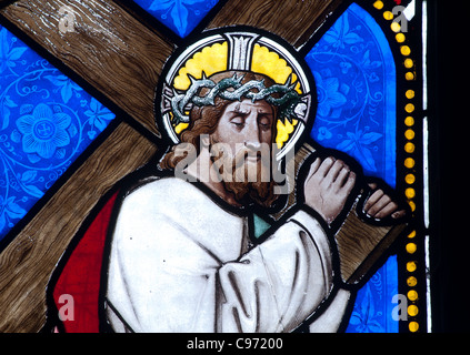 Christ carrying cross stained glass, St. Giles Church, Nether Whitacre, Warwickshire, England, UK Stock Photo