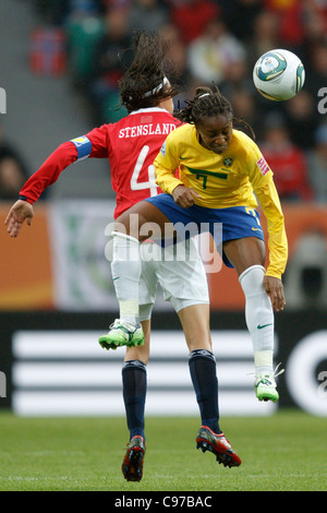 Ingvild Stensland of Norway (L) and Ester of Brazil (R) contest a ball during a 2011 FIFA Women's World Cup Group D match. Stock Photo