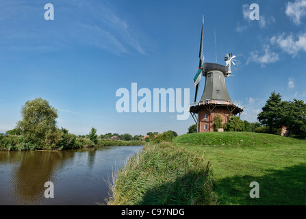 Windmill in Greetsiel, East Frisia, Lower Saxony, Germany Stock Photo