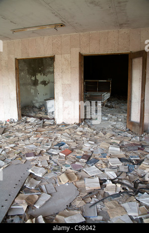 Piles of books scattered over the floor of the Palace of Culture Lenin Square, Pripyat Chernobyl exclusion zone Ukraine Stock Photo