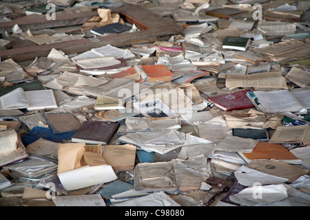 Piles of books scattered over the floor of the Palace of Culture Lenin Square, Pripyat Chernobyl exclusion zone Ukraine Stock Photo