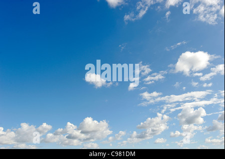 Cloud filled blue sky Stock Photo