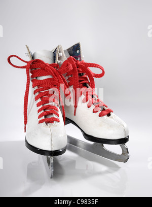 Ice skates with red laces isolated on white background Stock Photo