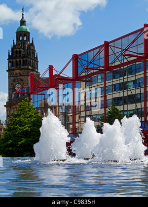 Fountain and pool in Sheffield City Centre South Yorkshire England UK with the Town Hall clock tower visible behind Stock Photo