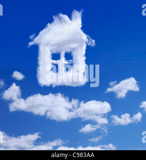 House made by clouds in blue sky Real estate Property insurance Home ownership housing concept Stock Photo