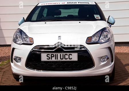 A new white Citroen with private registration number plate on display at the Alistair Fleming car dealer in urban Dundee , UK Stock Photo