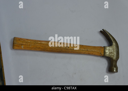 A claw hammer laying on flex sheet Stock Photo