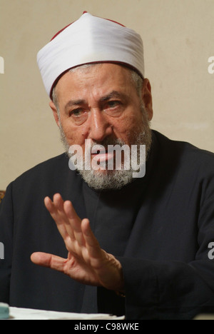 The head of the Mosque of Al Azhar, Sheikh Id Abdul Hamid Abdul Yussuf, in his office inside the Al Azhar Mosque. Stock Photo