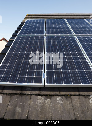 UK, Britain, Europe. Close-up of solar panels on a house roof. Stock Photo