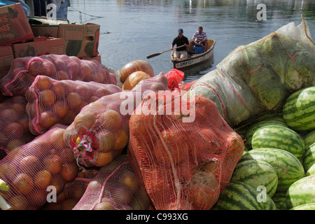 Willemstad Curaçao,Netherlands Lesser Leeward Antilles,ABC Islands,Punda,Sha Caprileskade,Floating Market,Waaigat,fruit,sack,stack,orange,melon,rowboa Stock Photo