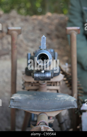 View looking down the muzzle of a German MG-42 at the 2011 War & Peace Show at Hop Farm, Kent, UK. Stock Photo
