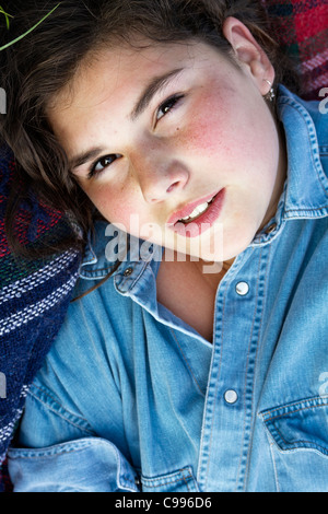 Naughty girl with denim shirt, summer close-up Stock Photo