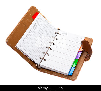 Opened personal organizer isolated on a white background. Stock Photo