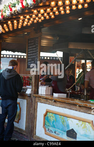 Stall serving food in Victoria Square at the Birmingham German Market.Taken on the opening day 17th November 2011. Stock Photo