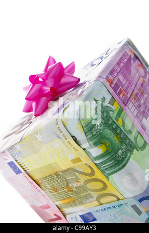 Different euro bills packed as a present isolated on a white background Stock Photo