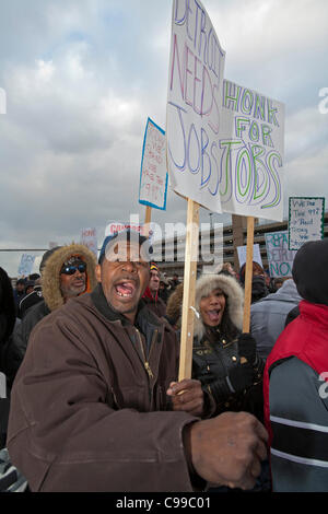 Detroit, Michigan - Supported by members of the Service Employees International Union and the United Auto Workers, members of the 'occupy' movement block a crumbling bridge to demand passage of President Obama's American Jobs Act. Stock Photo