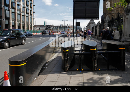 Security steel barrier near Westminster Abbey - London, England. Stock Photo