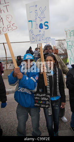 Detroit, Michigan - Supported by members of the Service Employees International Union and the United Auto Workers, members of the 'occupy' movement block a crumbling bridge to demand passage of President Obama's American Jobs Act. Stock Photo