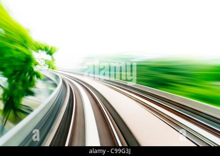 Motion blurred on speeding sky train. Stock Photo