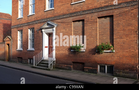 Historical house in Winchester UK with windows Bricked up due to the window tax imposed during the 1600 s by King william 3rd Stock Photo