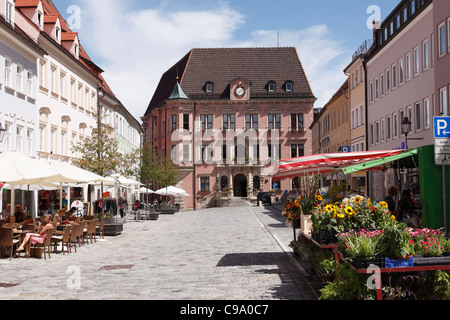 Germany, Bavaria, Swabia, Kaufbeuren, View of city hall with restaurant and flower shop Stock Photo