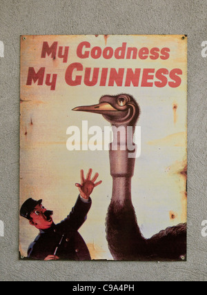 An Old metal sign advertising Guinness beer in a Dublin pub Stock Photo