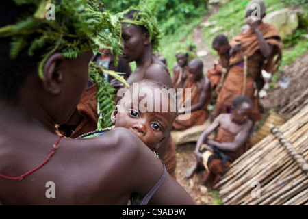 People of Mukuno village, traditional Batwa indigenous tribe from the Bwindi Impenetrable Forest in Uganda. Stock Photo