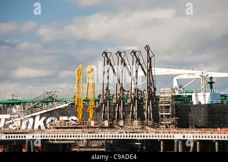 A Greek oil tanker docked at the Flotta oil terminal on the Island of Flotta in the Orkney's Scotland, UK Stock Photo
