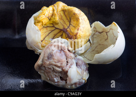 Balut Egg - an Asian street food delicacy - An example of the strange or weird food eaten by people around the world Stock Photo