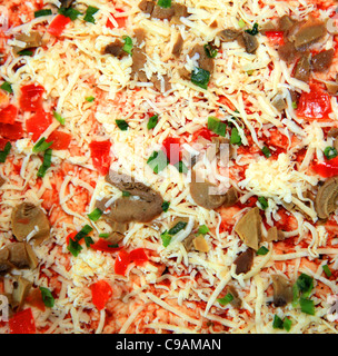 Unprepared vegetarian pizza. Close up. Front view. Stock Photo