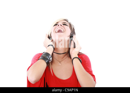 Young woman with a cool rocker style listening to music Stock Photo