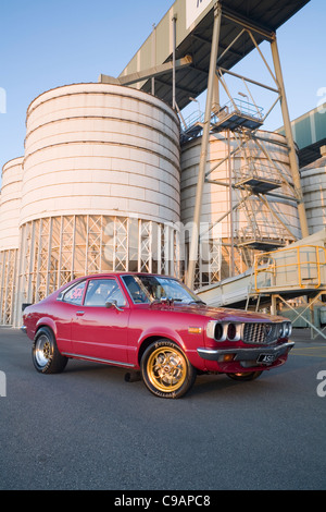 Mazda Rx3 Drag Racing Mazda RX3 drag racing car performing a burnout to heat up the rear ...