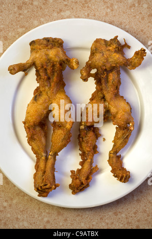 Fried Battered Frogs as sold in Phnom Penh Cambodia -  An example of the strange or weird food eaten by people around the world Stock Photo