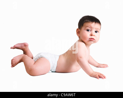 5 month baby boy on stomach lifting chest Stock Photo