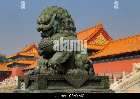 Bronze female lioness with baby at the Gate of Supreme Harmony in the Forbidden City Beijing Peoples Republic of China Stock Photo