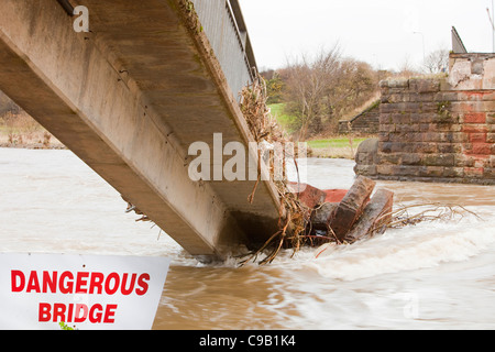 a footbridge over the River Derwent in Workington is one of many that was destroyed or damaged in the flood. Stock Photo