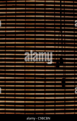 Back lit window bamboo blinds closed Stock Photo