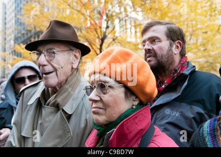 senior citizens participating in a low-impact chair aerobics class