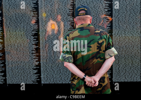 A Vietnam war veteran pay his respects  at 'The Moving Wall' memorial that was erected in Santa Barbara, CA U.S.A Stock Photo