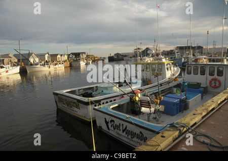 Fishing boats sit in the working harbor of North Lake Harbor, Prince Edward Island Stock Photo