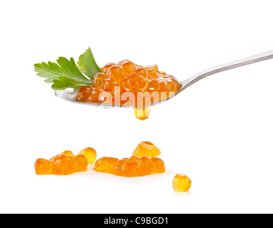Spoon with red caviar on white background Stock Photo
