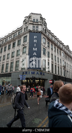 People walking past Primark store in Central Manchester, England, UK   KATHY DEWITT Stock Photo